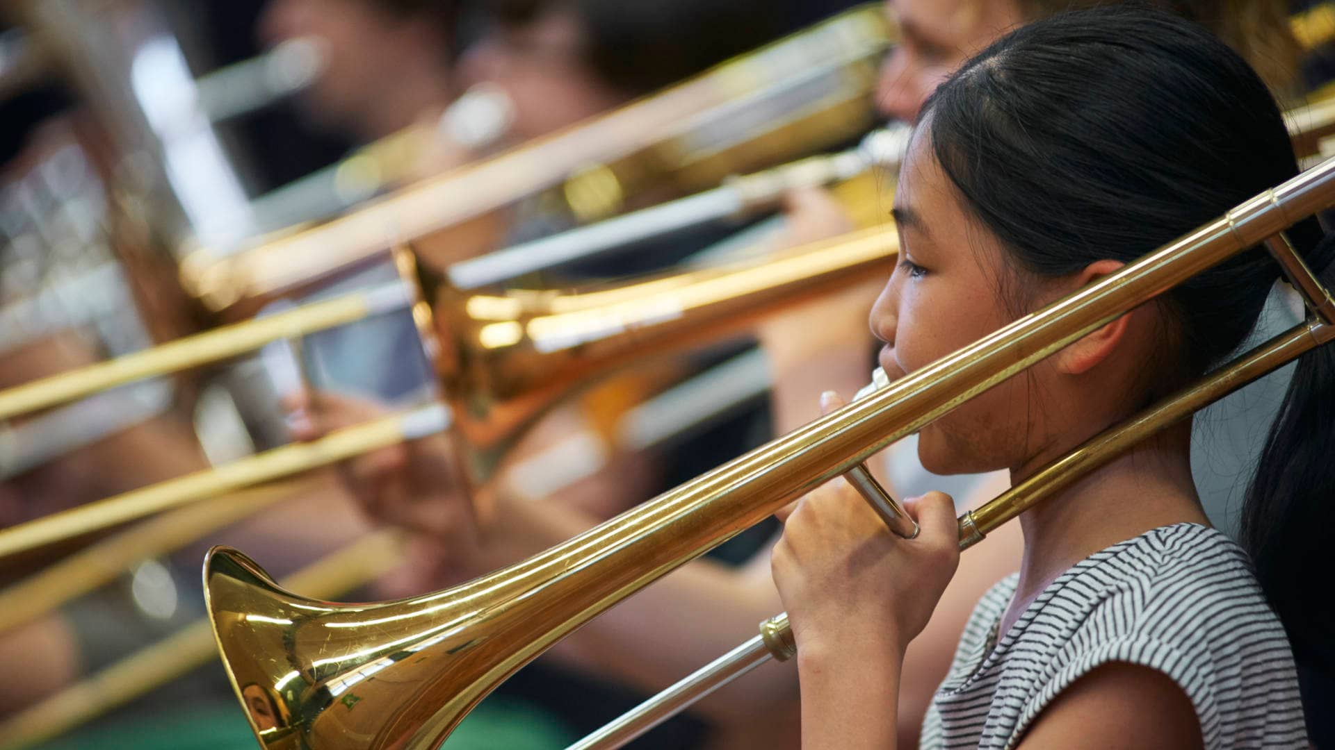 Sydney Youth Orchestras Girl Playing Trombone Goodear Products By Symphony Services